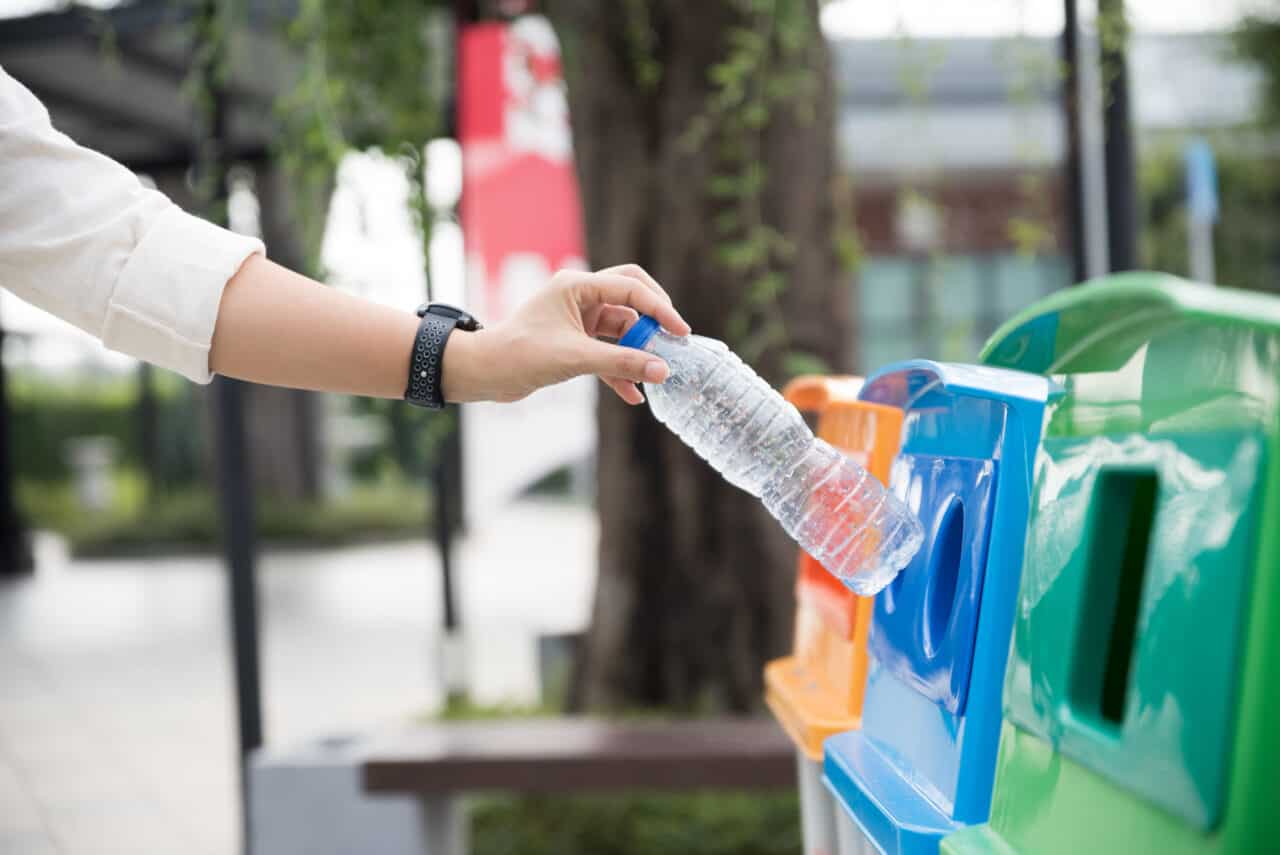 Пустую пластиковую. Throw Bottle in Air. From the Side hand throwing Plastic Bottle on the Road free stock photo.